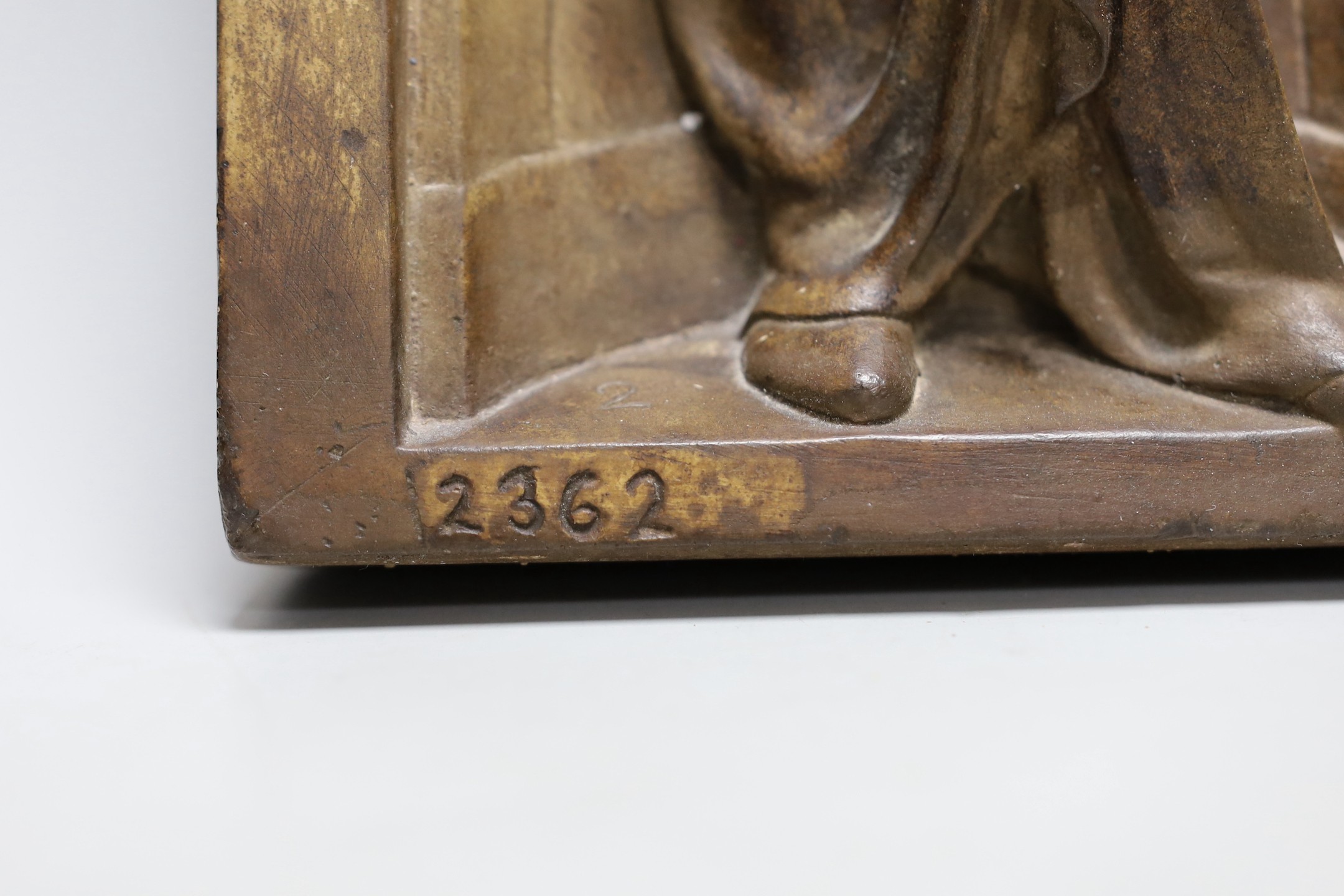 A religious cast plaster figure in niche, numbered 2362. 53cm tall
